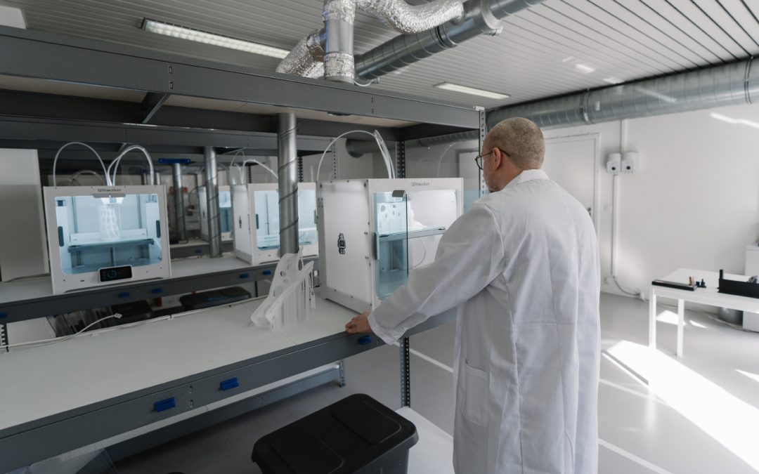 man working in a plastics injection cleanroom