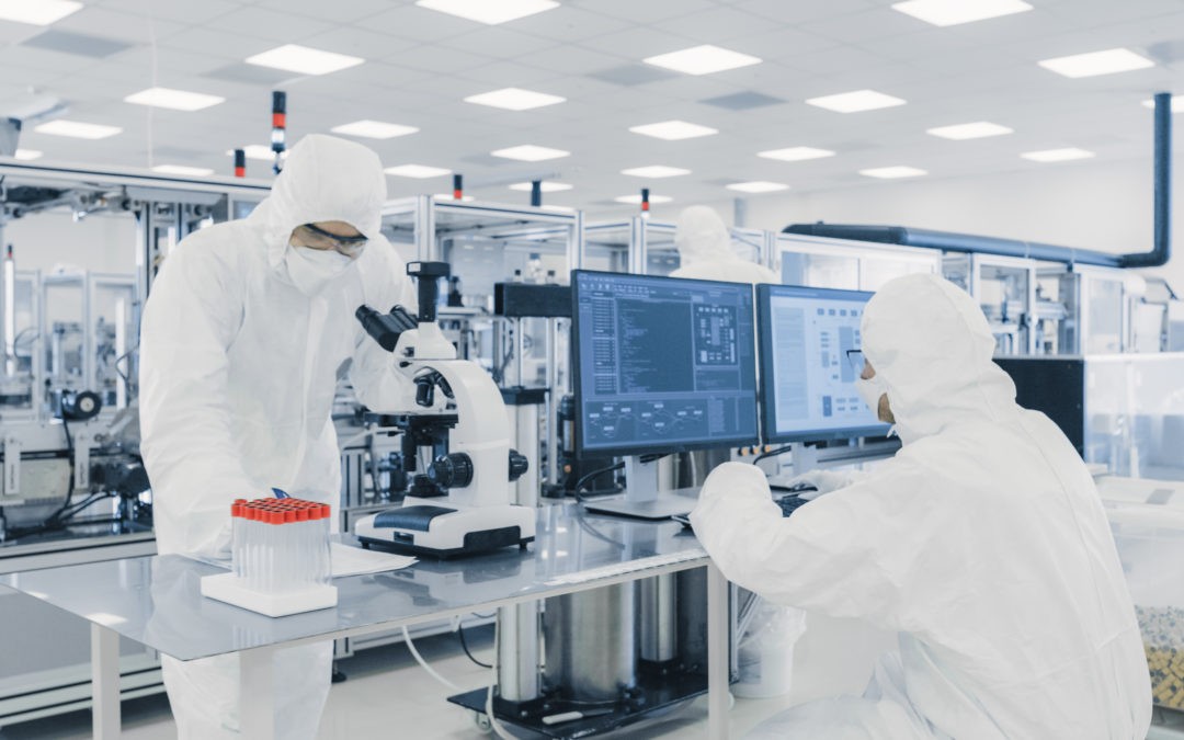 scientists working in medical cleanrooms